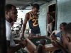Dorsen, Pelikito, Franklin e Johnson giocano a Domino. Batey Lichi Lichima, provincia de La Romana -  Repubblica Dominicana